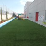 CÉSPED ARTIFICIAL COLEGIOS GASPAROT Y LA ERMITA SISTEMA COMPOECO PARQUES INFANTILES